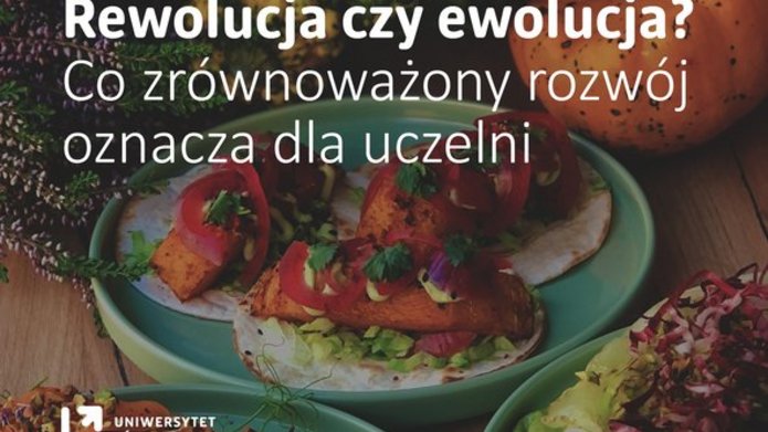 Zdjęcie przedstawia stół z jedzeniem, z warzywami na głównym planie