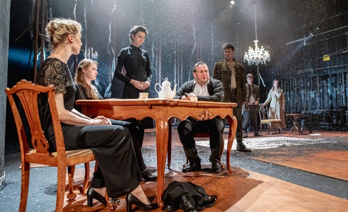 A scene from the play The Biedermanns with actors from the Powszechny Theatre