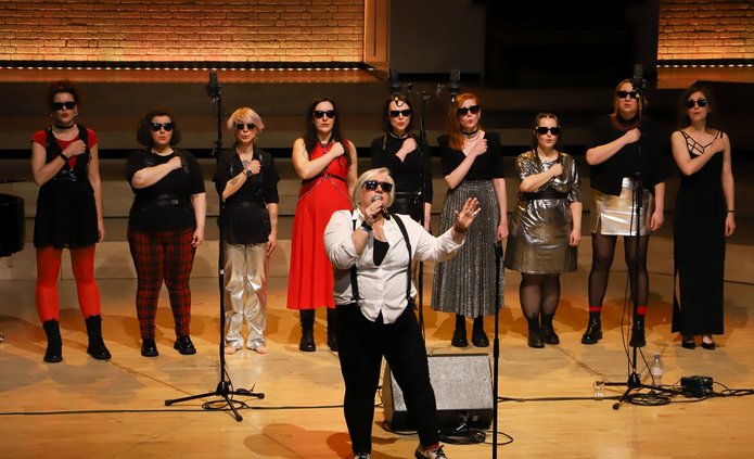 Singing and dancing women who are on stage