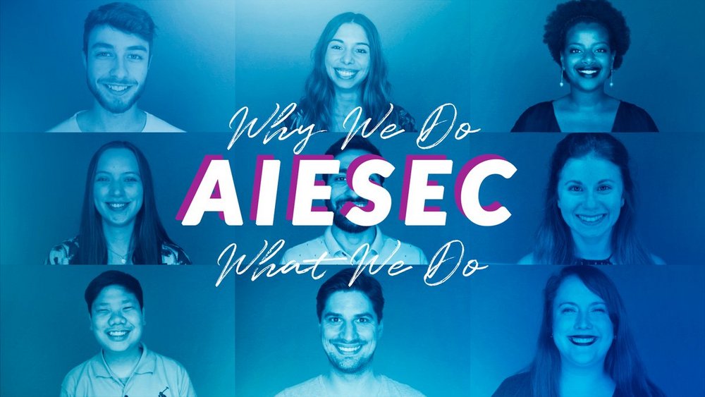 Napis Why we do what we do na tle uśmiechniętych twarzy