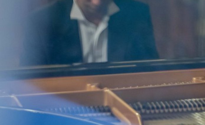 A man sitting at the piano