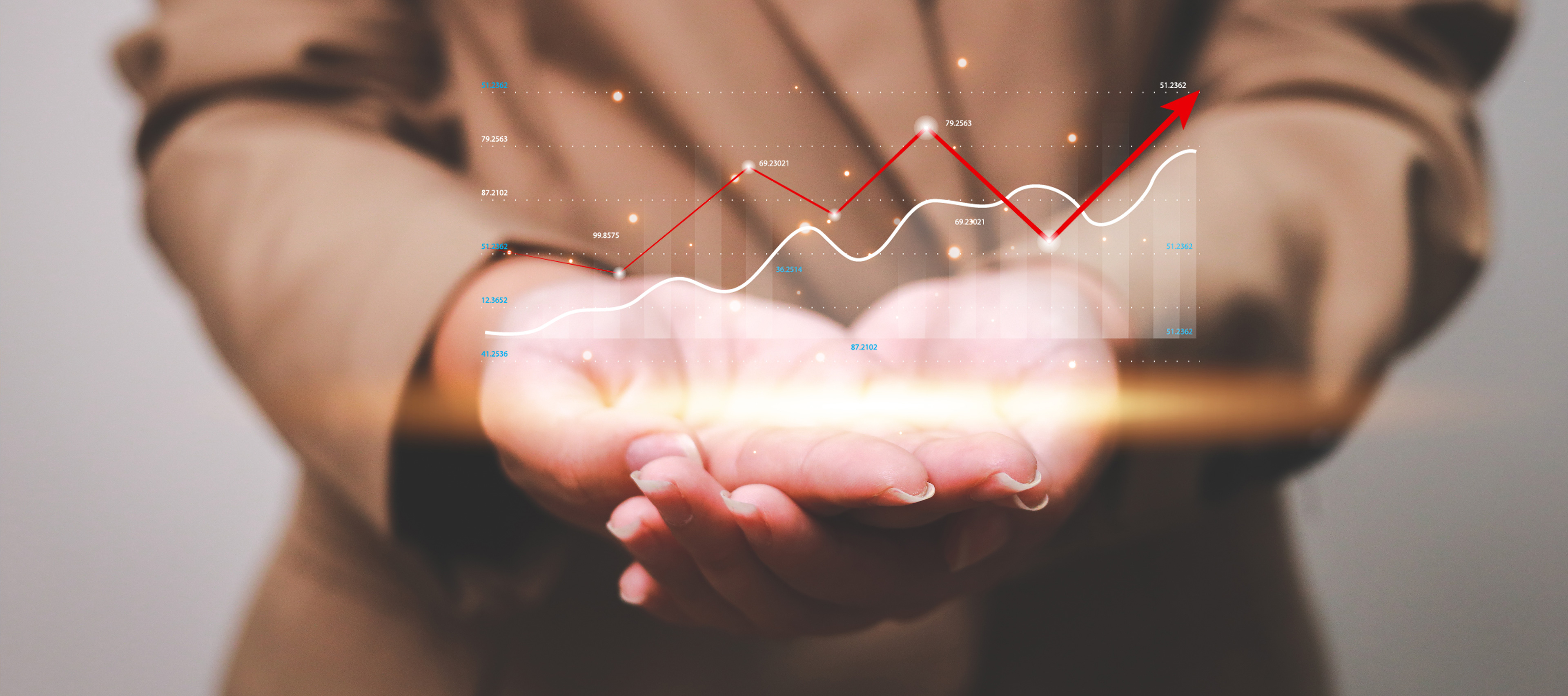 Widok wirtualnego wykresu trzymanego na dłoniach